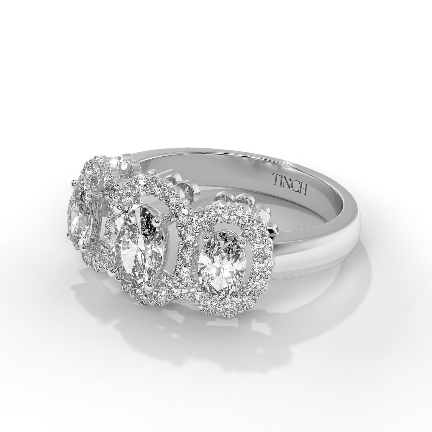 Three Stone Halo Ring