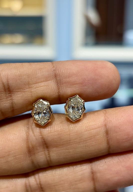 Oval Solitaire Studs in Crown setting