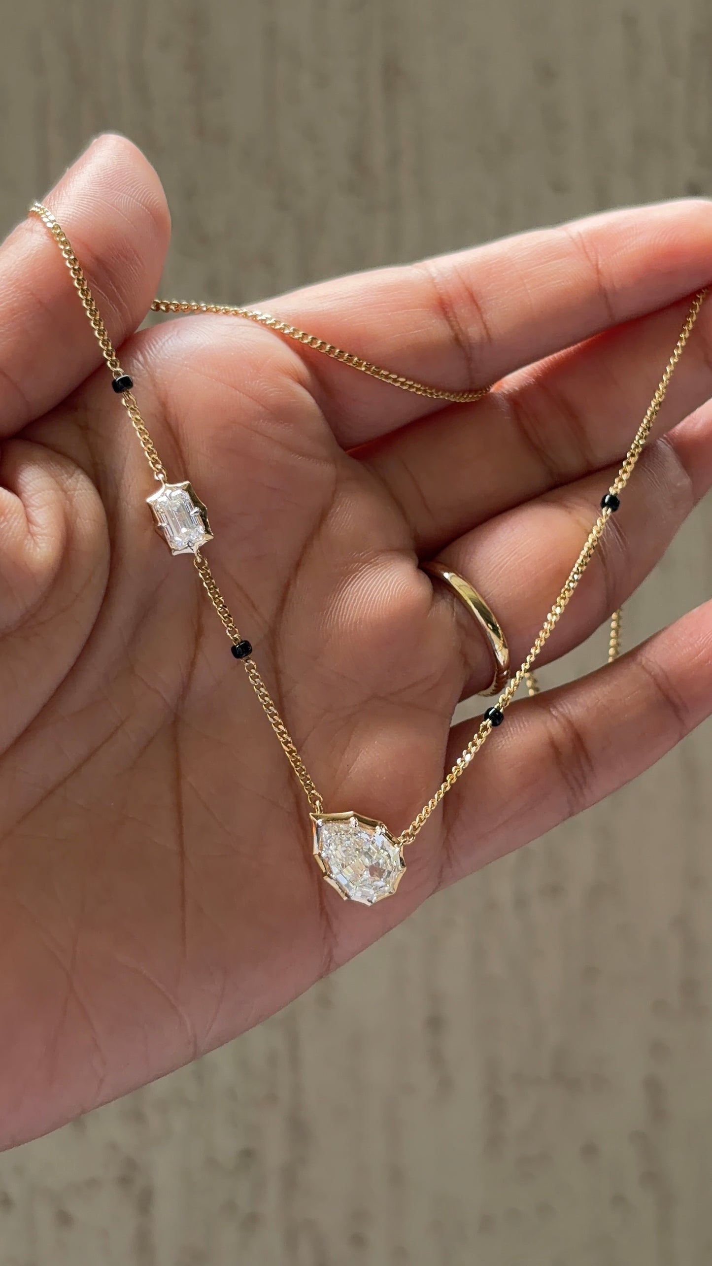 Step Cut Pear Diamond Mangalsutra with Emerald Charm